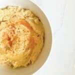homemade hummus in a white bowl