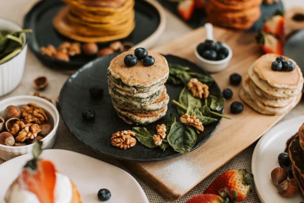 banana spinach pancakes on a food board