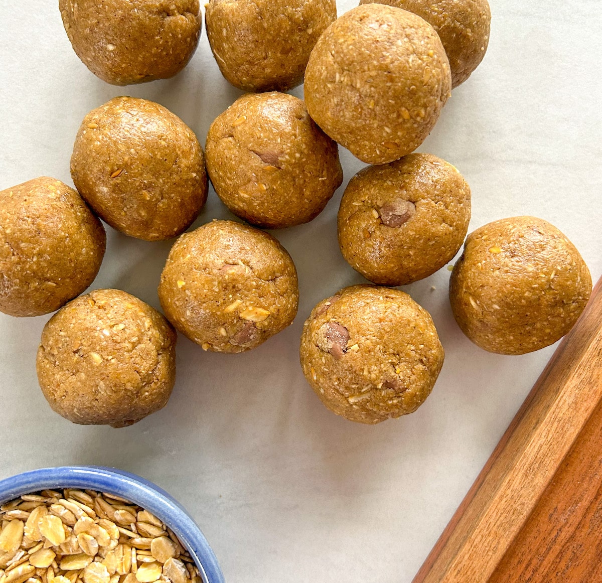 Nut free protein balls on a white counter