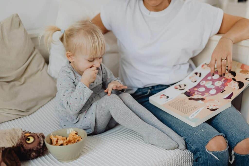 toddler eating a healthy snack before bed