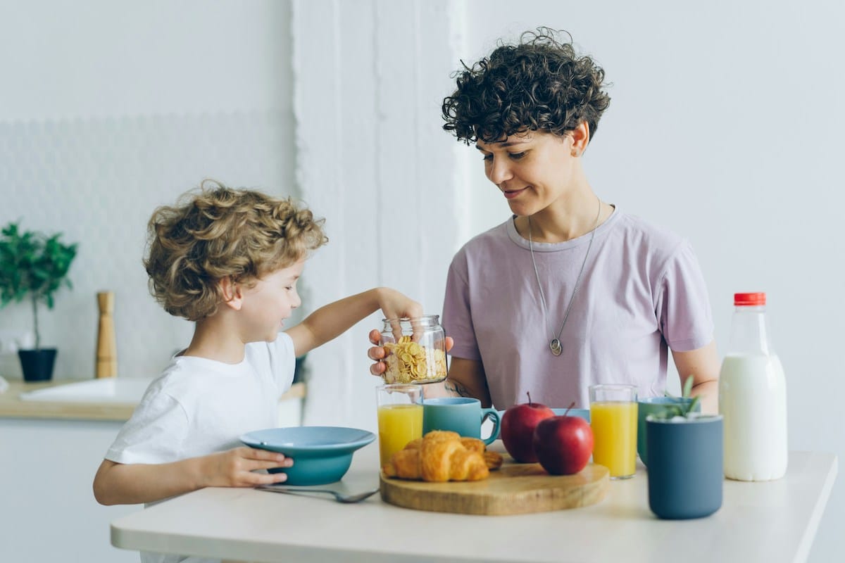 mother and son eating breakfast