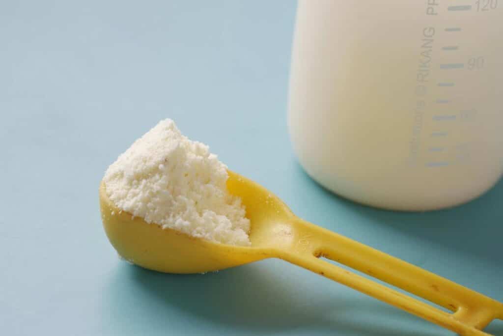 baby formula in a spoon